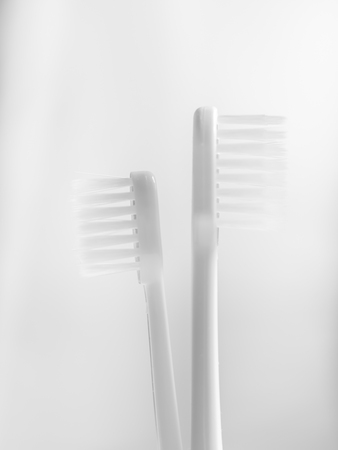Black and white tone of two toothbrushes. Concepts and ideas of couple, conflict or split up. の写真素材