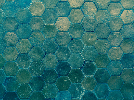 Cross processed, vintage tone. Abstract turquoise color of hexagon tiles or mosaic pattern, texture...