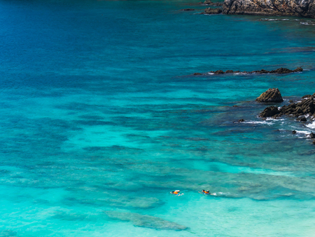 The tourist are snorkeling in clean and clear blue sea .の写真素材