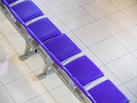 Top view of airport waiting chairs or seating within the terminal.