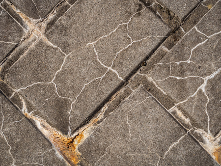 Abstract cracked cement or concrete brick texture with grid pattern for background.の写真素材