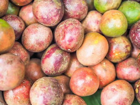 Closeup of passion fruits pattern in the market or super store.の写真素材