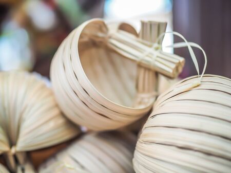 Ancient natural drinking cup of bowl, made from dry leaves in Asian local market.の写真素材