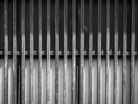 Abstract black and white tone of grids pattern of wooden wall background.の写真素材