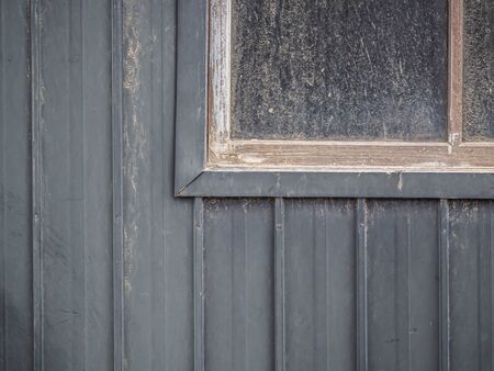 Abstract background of house or home or resident old metal or aluminum zinc wall and window frame...
