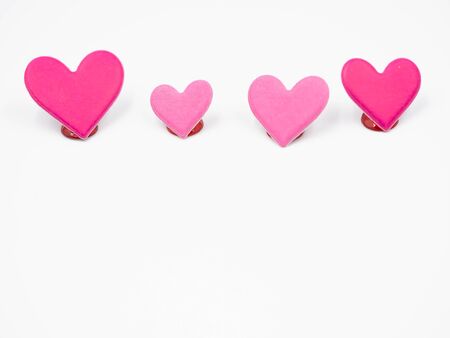 Closeup of vivid and vibrant pink and pastel pink hearts shape on gray color background. Valentine 's day, wedding ,love, sweet and romance concepts and ideas.の写真素材