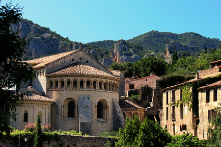 Saint Guilhem le desert church in a cloudy dayDetails in Saint Guilhem le desert, a town in south of Franceの写真素材