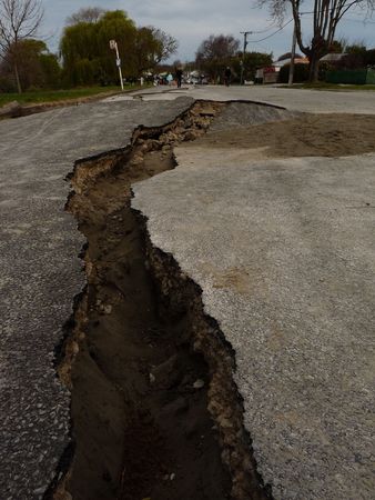 Christchurch, New Zealand, September 4 2010: Crack in road from Earthquake by Avon Riverのeditorial素材