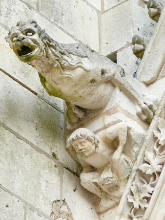 Gargoyles on a church in Franceの写真素材