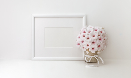 Horizontal frame mockup, styled stock photos, white flowersの写真素材