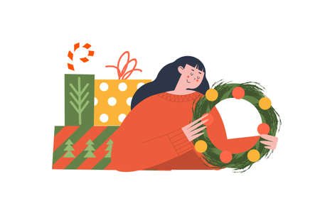 A cute girl with a Christmas wreath and New Year's gifts. Festive cozy vector illustration.のイラスト素材