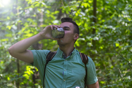 A man walks in the woods. A traveler, a tourist. Summer. Autumn.の写真素材