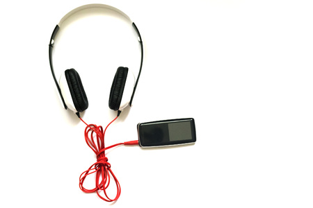 White headphones with red cordの写真素材