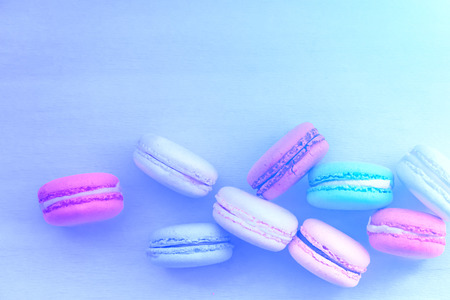 Macaroon. The bright colored rolls, cookies. The background substrate.の写真素材
