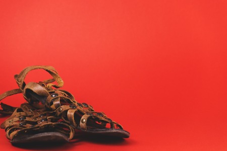 Female shoes on red background.の写真素材