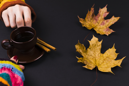The man gives the girl the tea. Close-upの写真素材