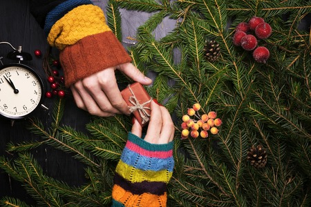 A man and a woman decorate the Christmas tree together. The view from the top.の写真素材