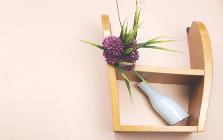 Vase and flower on the shelfの写真素材