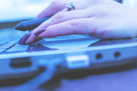 The girl works at the computer. Decorator. Manager. Close upの写真素材