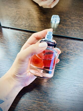 The girl chooses cosmetics. Mobile photo. A close-upの写真素材