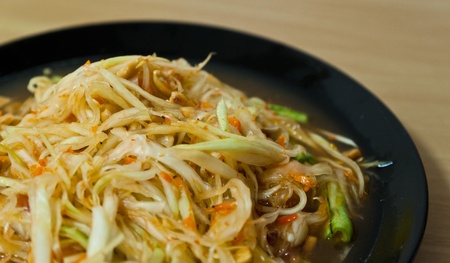 somtum or Green Papaya Salad is the most popular dish in Thailandの写真素材
