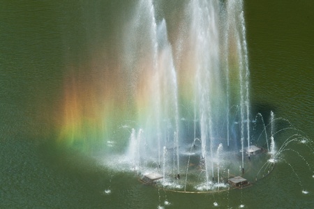 rainbow in water fountainの写真素材
