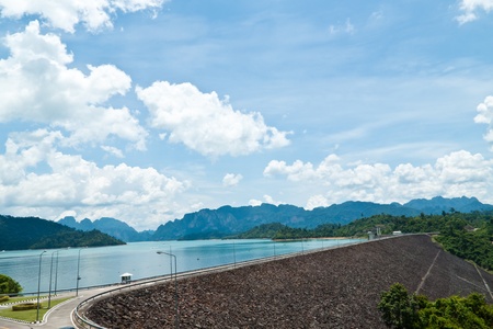 water flowing over flood gates of a damの写真素材