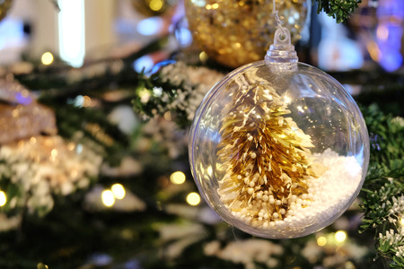 Gold christmas tree in glass ball, Christmas Trimmingsの写真素材
