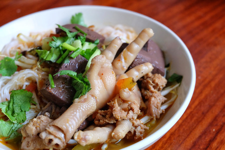 Kanom Jeen Nam Ngeaw  Rice noodles with spicy pork sauce and Chicken foot. Local food in Northern...
