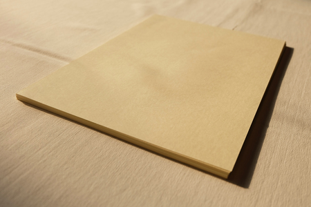 Stack of green read paper on tableの写真素材