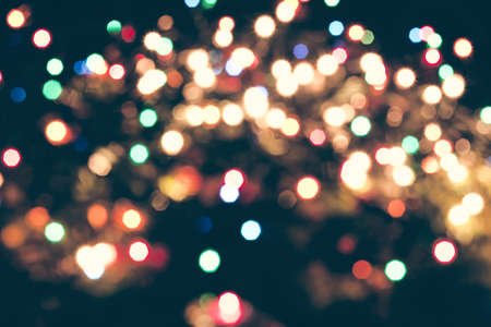 Christmas background with bluried lightsの写真素材