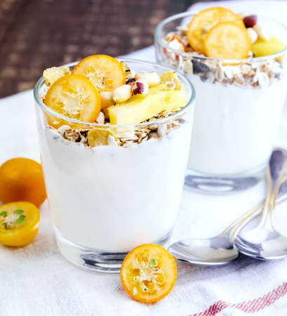 Yogurt with pineapple citrus and muesli Close upの写真素材