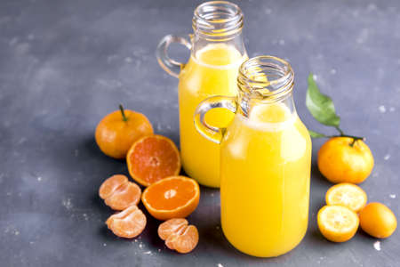 Two Bottle with citrus juiceの写真素材