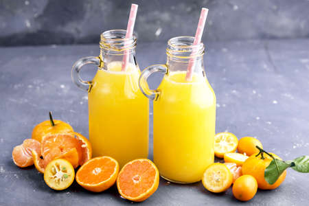 Two Bottle with citrus juiceの写真素材