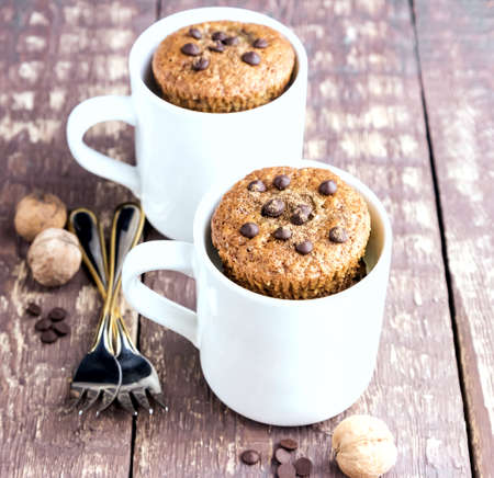 Muffins in mugs Chocolate dropsの写真素材