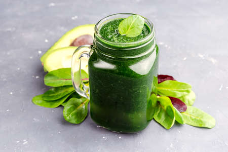 Spinach and Avocado green smoothieの写真素材