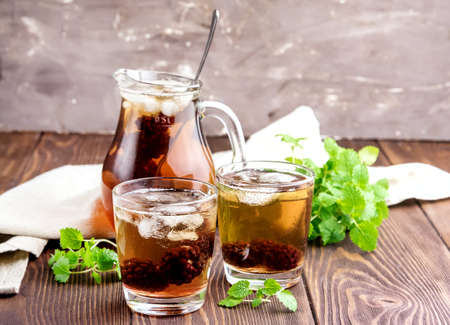 Tea with berry mint and ice cubeの写真素材