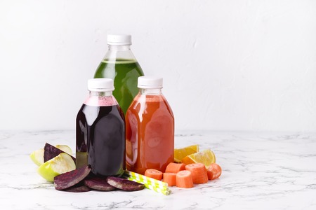 Beetroot Carrots Orange Green Apple Healthy Juice Detox Juice in Bottle Healthy Diet Food Horizontal Copy Spaceの写真素材