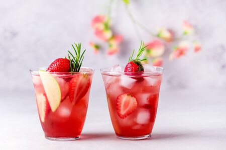 Glasses of Fresh and Cold Strawbery and Green Apple Lemonade Tasty and Healthy Summer Drink Cold Berry and Fruit Lemonadeの写真素材