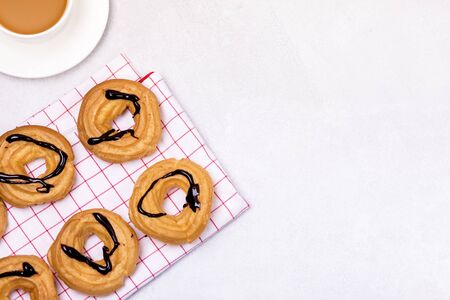 Tasty Home Baking Eclair with Cottage Cheese and Chocolate Sauce Tasty Homemade Dessert Top View Flat Lay Horizontal Coffeeの写真素材