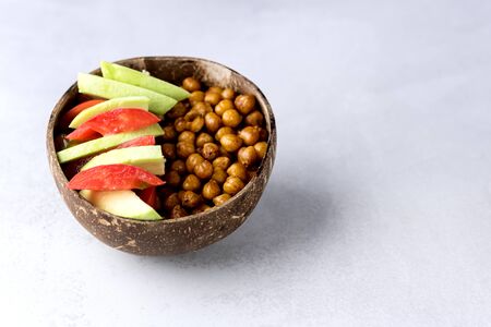 Healhty Vegan Lunch Bowl with Avocado Tomato Chickpeas Vegetables Salad Top View Horizontal Copy Spaceの写真素材