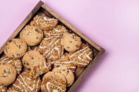 Variety of Tasty Homemade Cookies Box of Pastry Cookies Dessert Glass of Milk Top View Copy Space