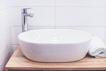 Modern Bathroom With White Sinks White Towel Horizontalの写真素材
