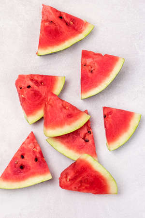 Tasty and Fresh Slices of Red Watermelon Top View Blue Background Vertical