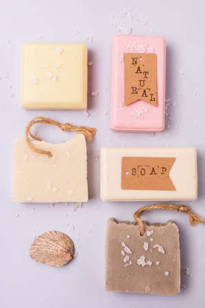 Variety of Natural Soaps on Blue Background Handmade Organic Soaps Vertical Flat Layの写真素材