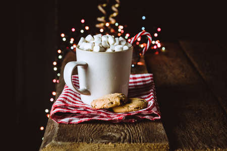 Cup of Hot Cocoa with Mini Marshmallows and Cookies on Red Napkin Old Wooden Background Beautiful...