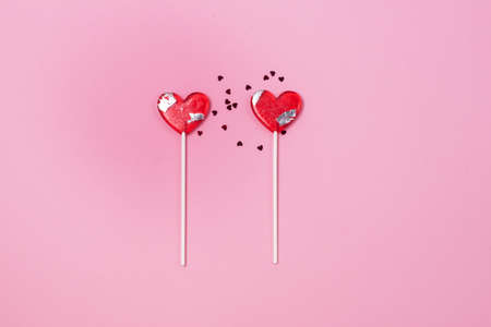 Two Lollipops Hearts Red Confetti Candy Love Concept Valentine Day Horizontalの写真素材