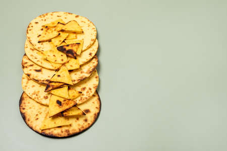 Homemade Tortilla on Green Background Horizontal Top View Copy Spaceの写真素材
