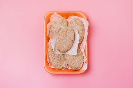 Frozen Ground Meat Cutlets Pink Background Frozen Semi Finished Products Horizontal Top Viewの写真素材