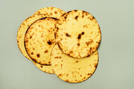Homemade Tortilla on Green Background Horizontal Top Viewの写真素材